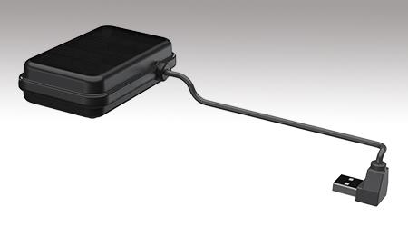 A small black enclosure with a USB cable protruding.