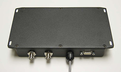 A sealed die-cast electronics enclosure with several connectors installed.